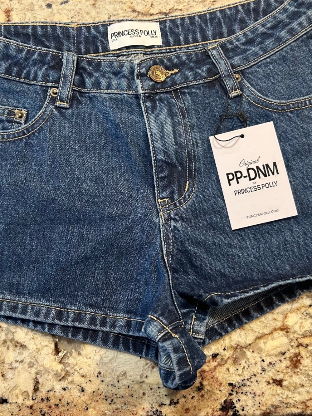 NWT Size 4 High demand PRINCESS POLLY low rise dark wash denim shorts